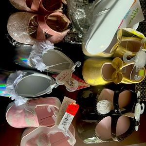 Baby shoes. Girls. All brand new with tags. Size is 6-9 months.